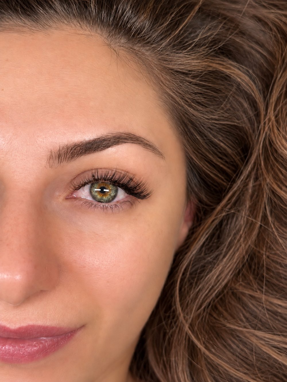 2D lash extensions on hazel eyes